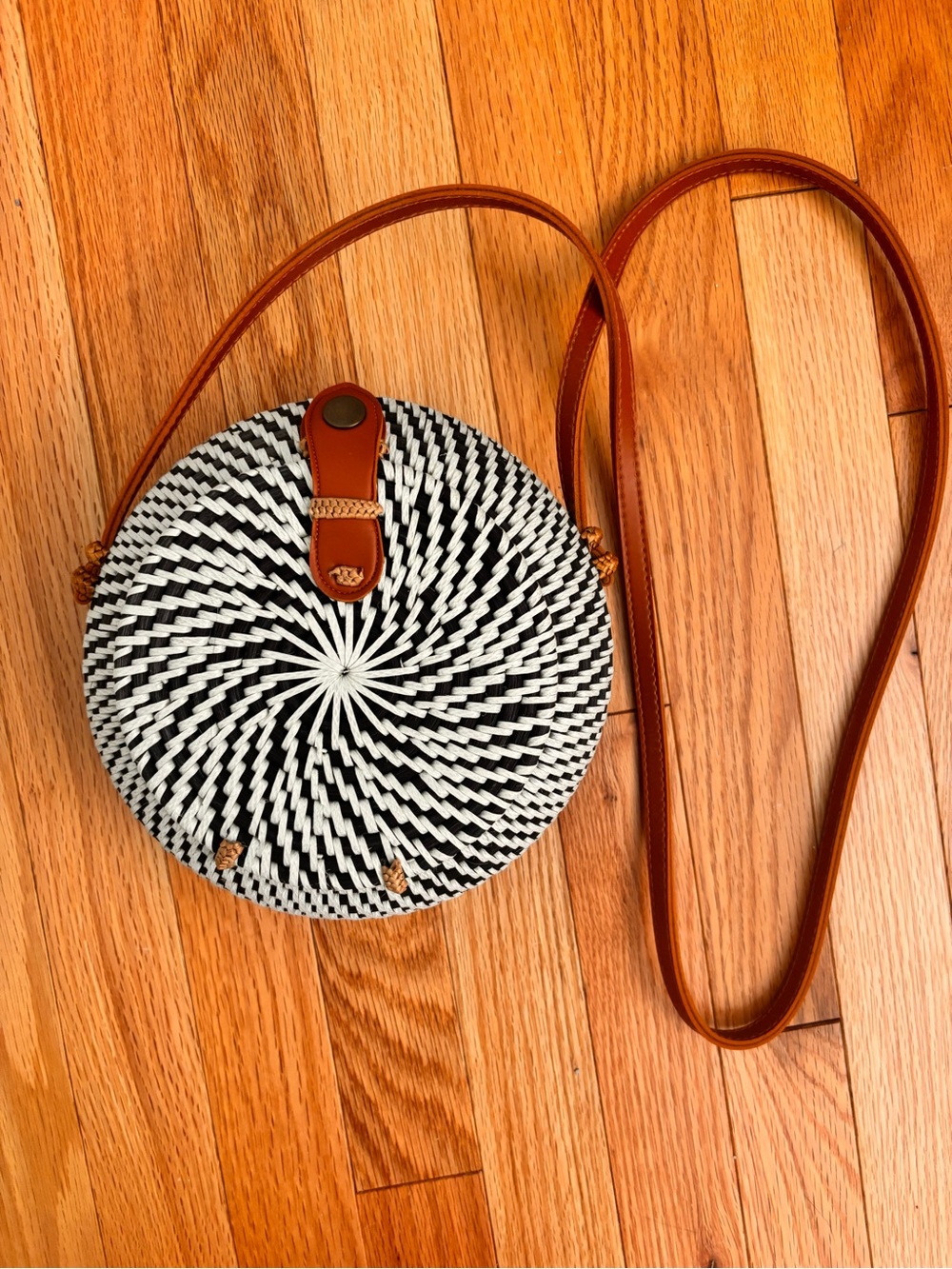 Urban Outfitters Black & White Round Woven Crossbody basket bag with Brown Strap